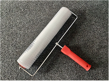Spiked Flooring Roller, with plastic handle